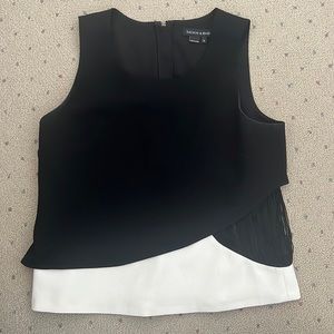 Sachin and Babi black and white top with fringe.